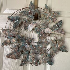 “Butterflies are free”  Wonderful circle of flying metal butterflies wall art.